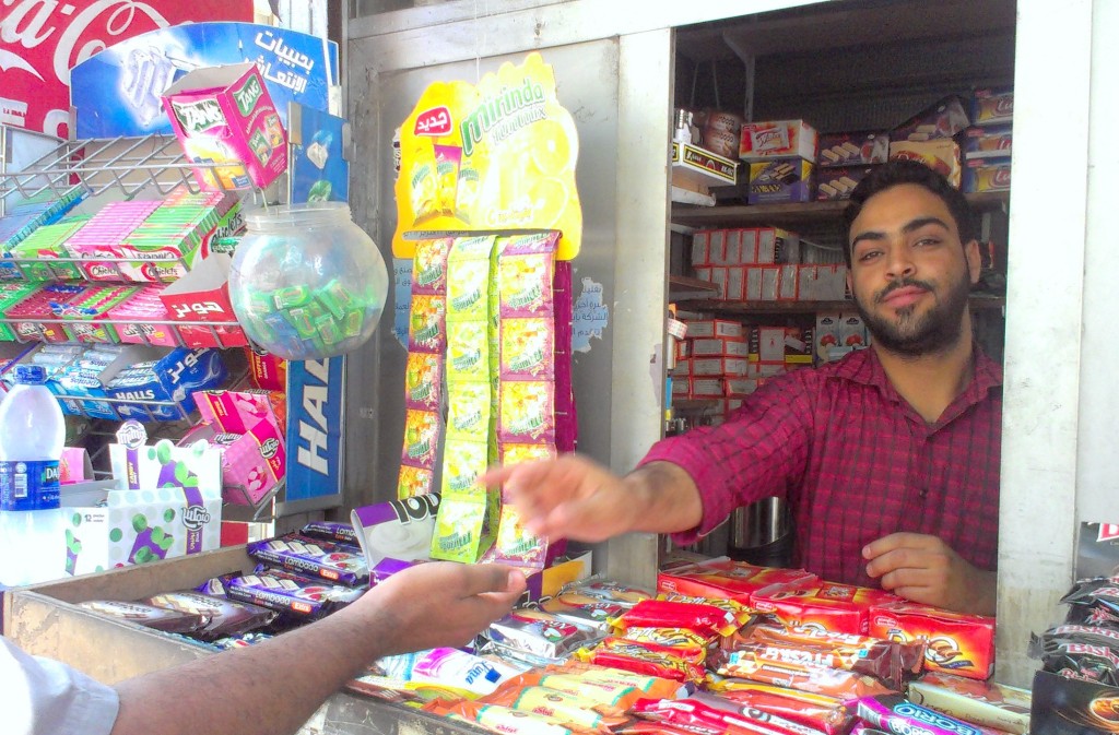 A vendor at his kiosk in Cairo