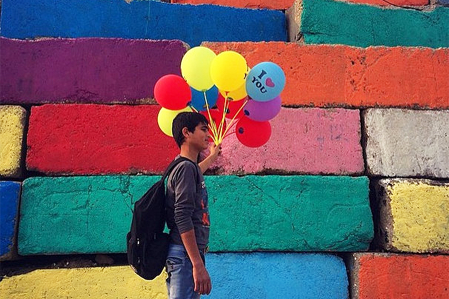 Palestinian boy selling balloons in Gaza